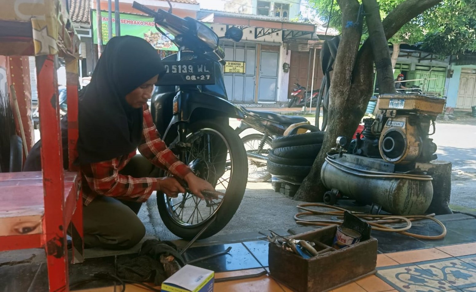 Ibu Sani, Wanita Tangguh